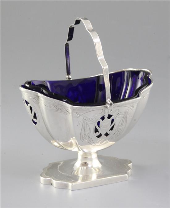 A George IV silver swing handled sugar basket, height 170mm, weight 7.6oz/238grms.